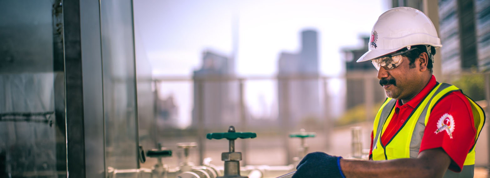 A Transguard Technician fixing a pipe